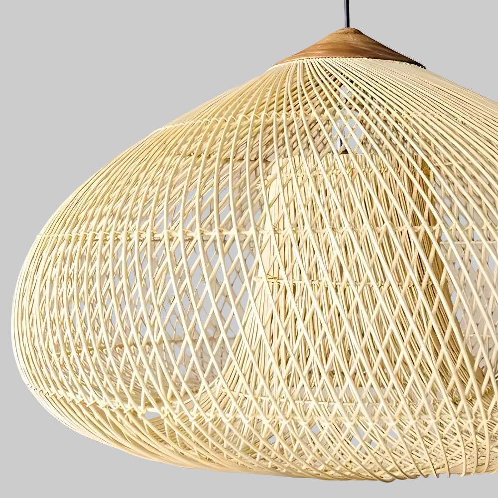 Elegant rattan lamp illuminating a dining area