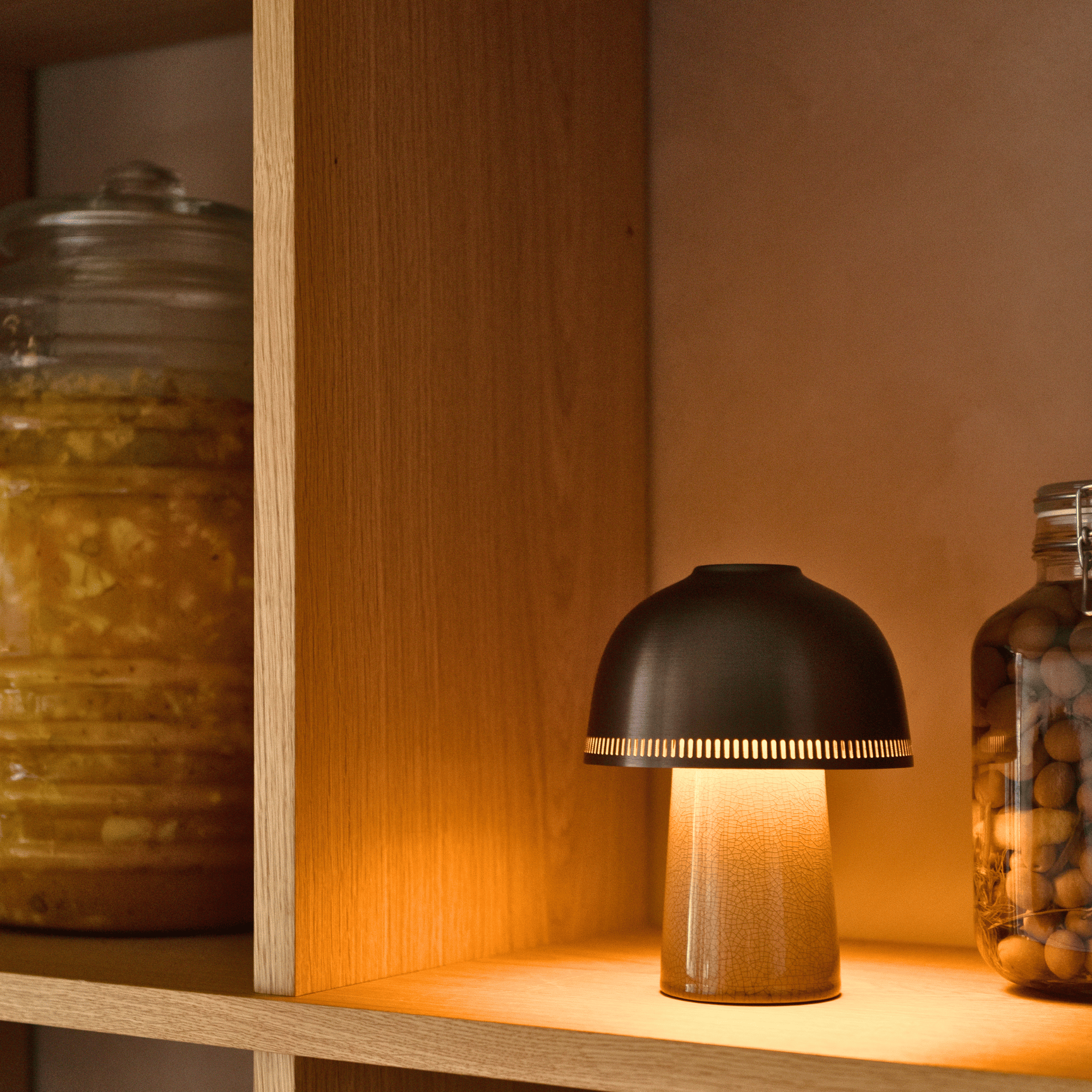 Kintsu lamp displayed on a bedside table